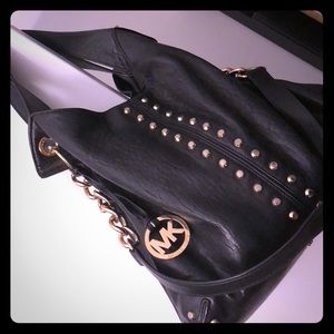 Michael Kors studded satchel.
